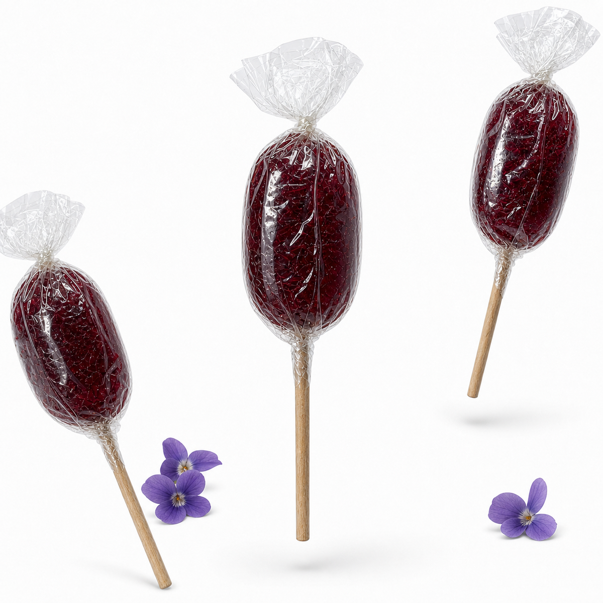 Maison Ratti Violet Lollipop, pouches in a styled scene